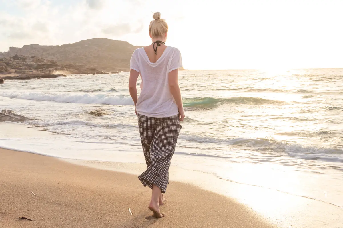 Woman walking on the beach