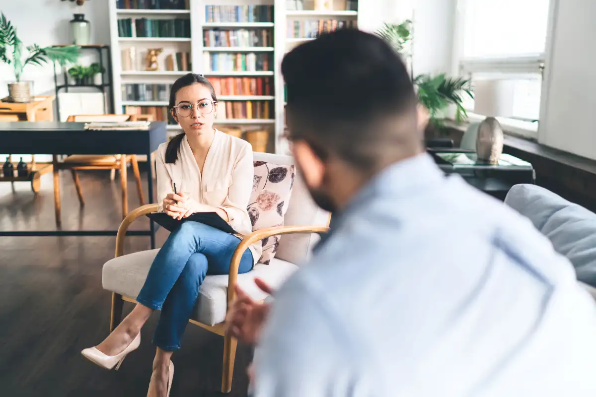 a male client and a female psychologist during one on one counseling in Menifee CA