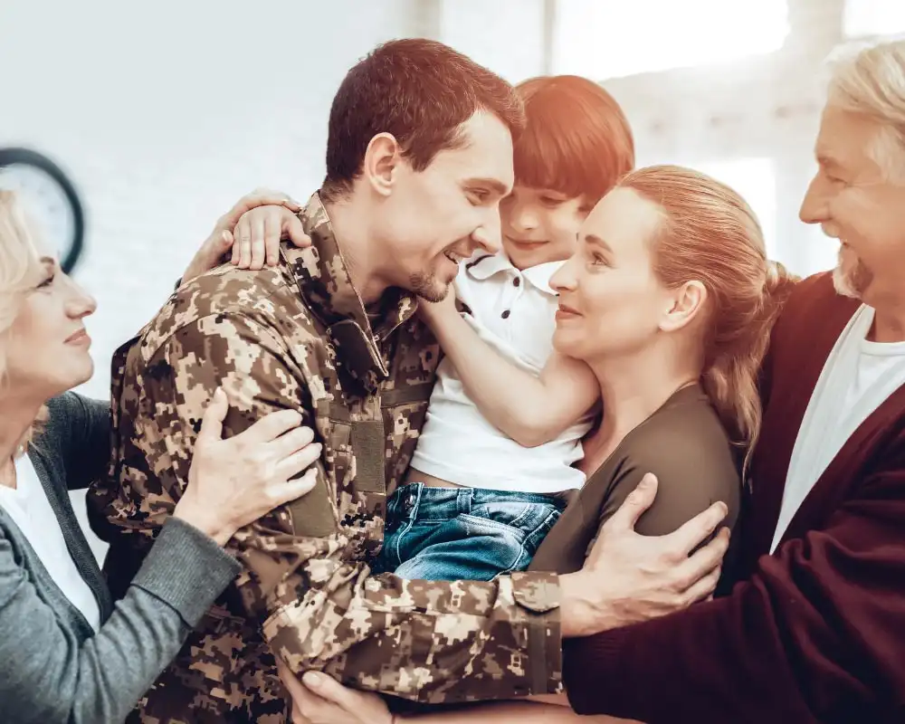 a male soldier with his family