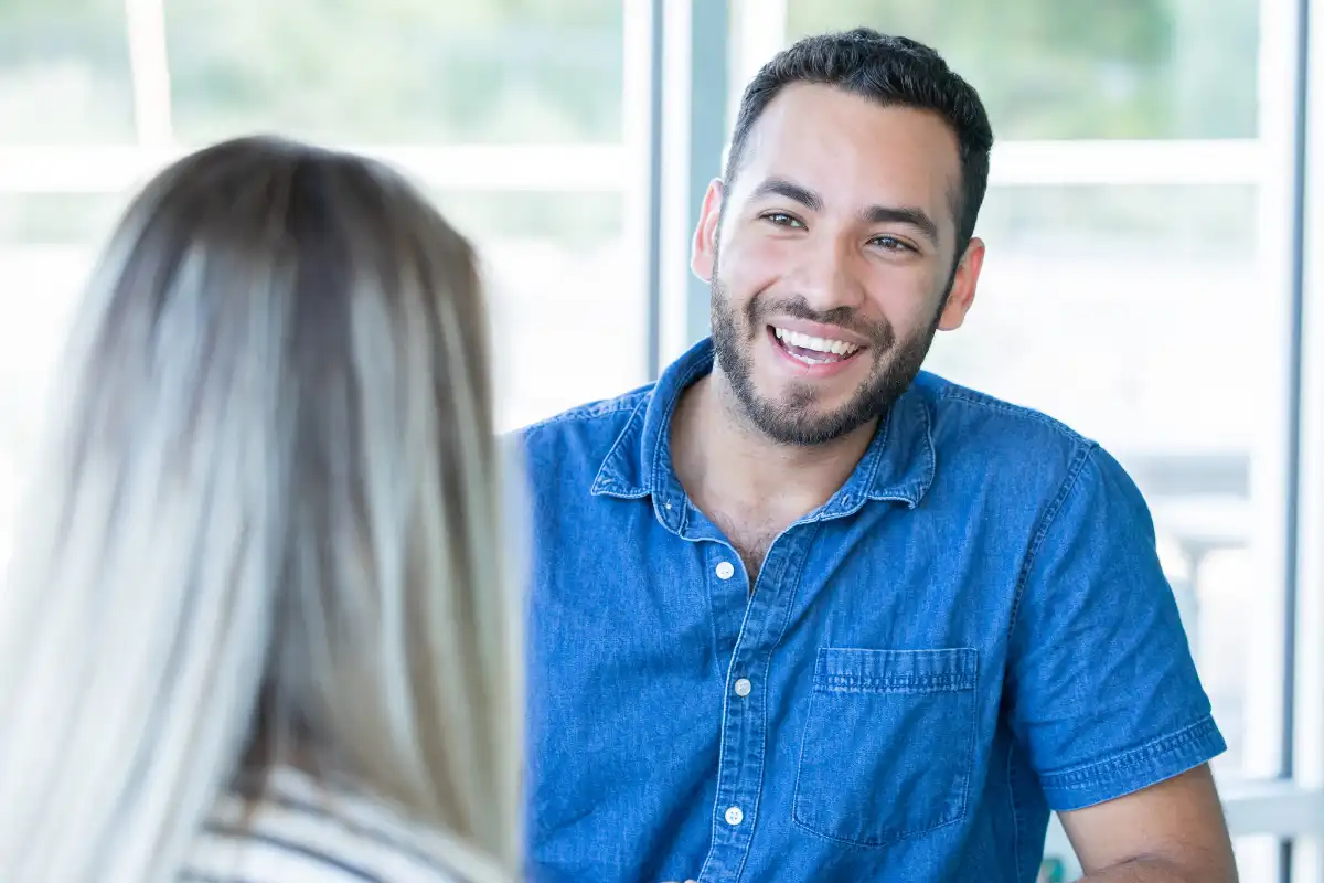 a man and a female psychologist durine one on one counseling