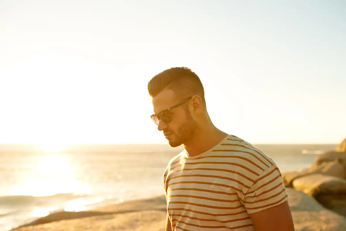 a man walking on the shore